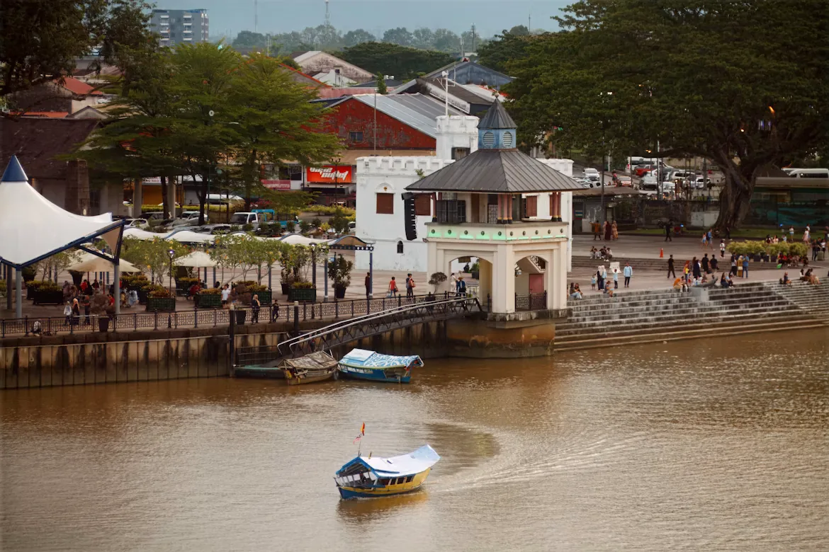 The Kuching waterfront on a working afternoon.